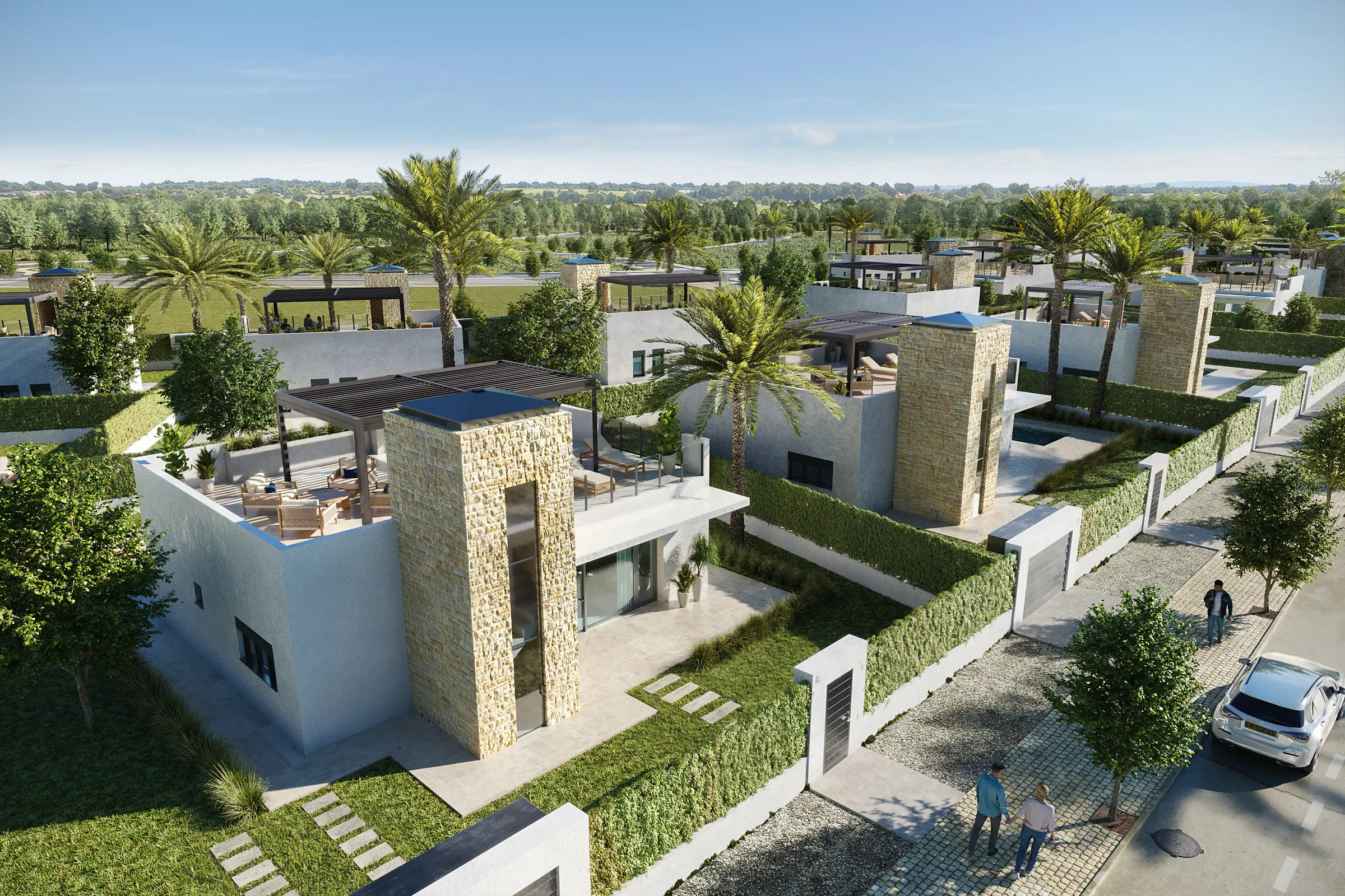 Luchtfoto van het villacomplex met tuinen en palmbomen